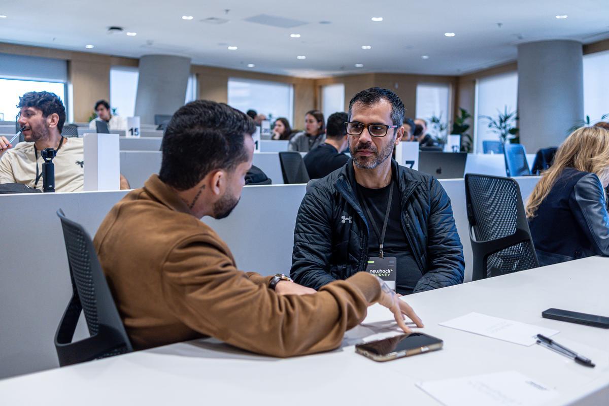 Mentoria 1:1 entre founder e mentor em um evento NewHack